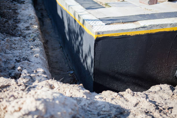 Professional Exterior Waterproofing technician working in Rochester, IL